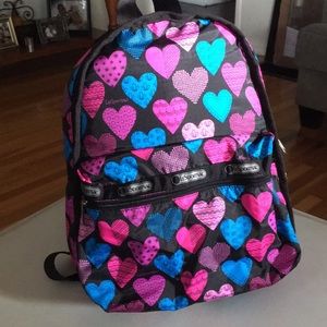 LeSportsac Backpack with matching pouch.